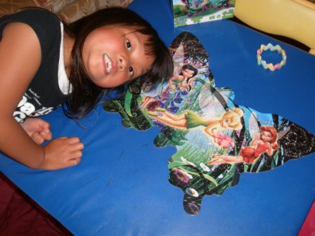 Kasen with her Tinkerbell puzzle